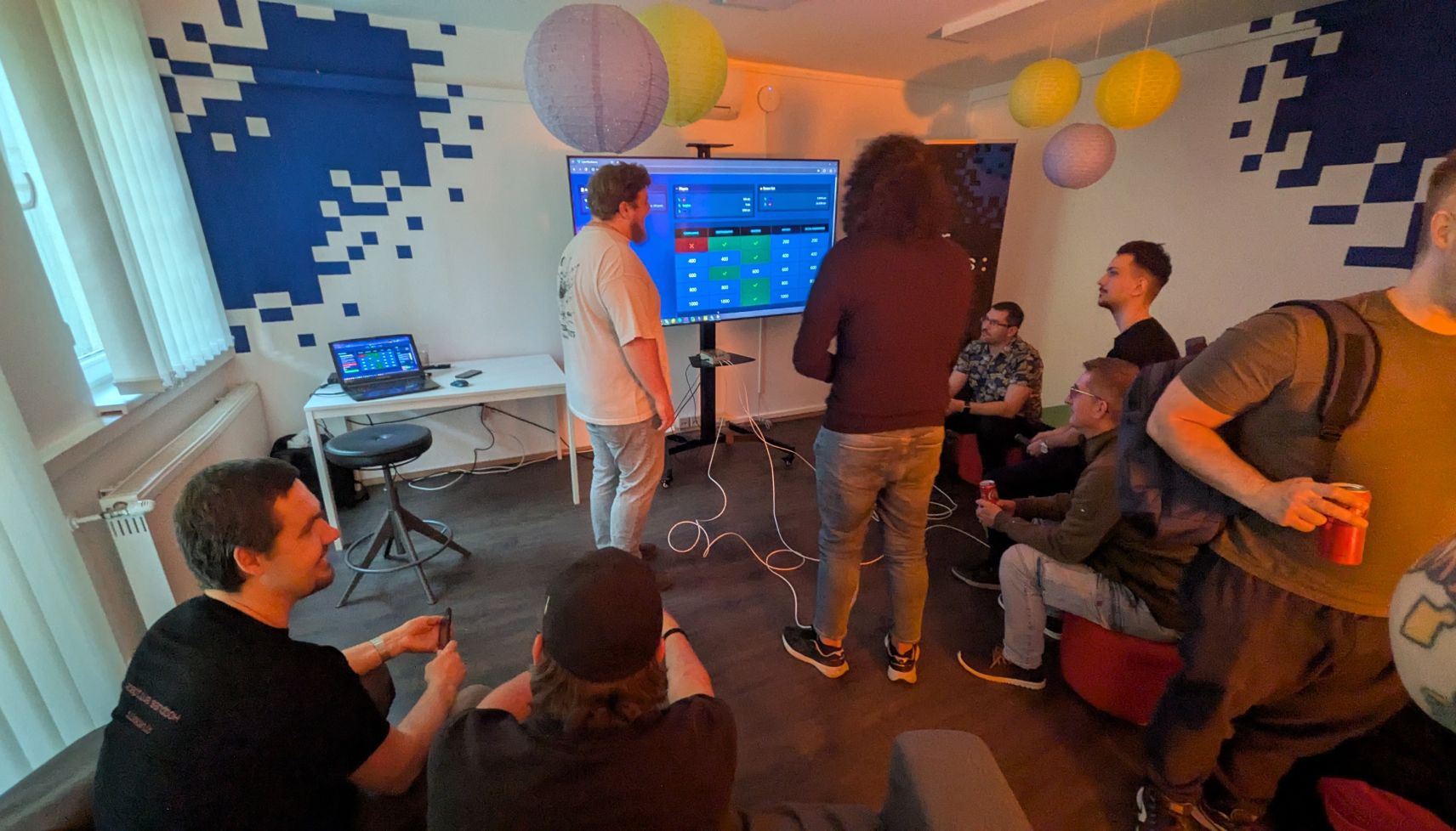 MetaDefender Sandbox Team presents groundbreaking research to a group viewing a large screen with data in Budapest