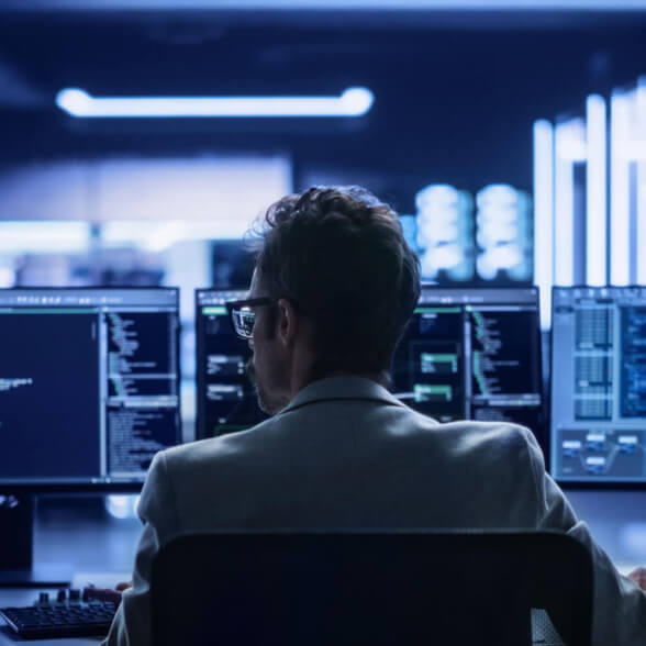 Researcher analyzing code, representing vulnerability discovery in Mongoose library