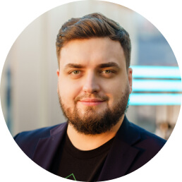 Headshot of Vlad Iliushin, President and CEO of AMTSO