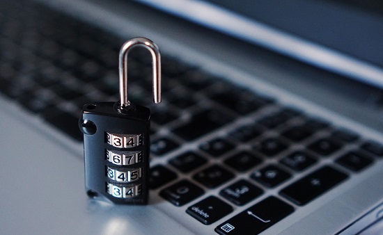 Computer with Unlocked Padlock
