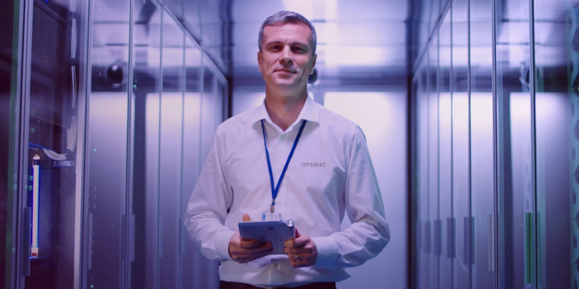IT professional in a server room, representing cybersecurity training and support services