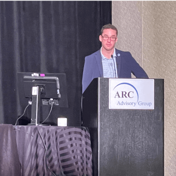 Pete Lund, VP of Products OT Security standing at a podium