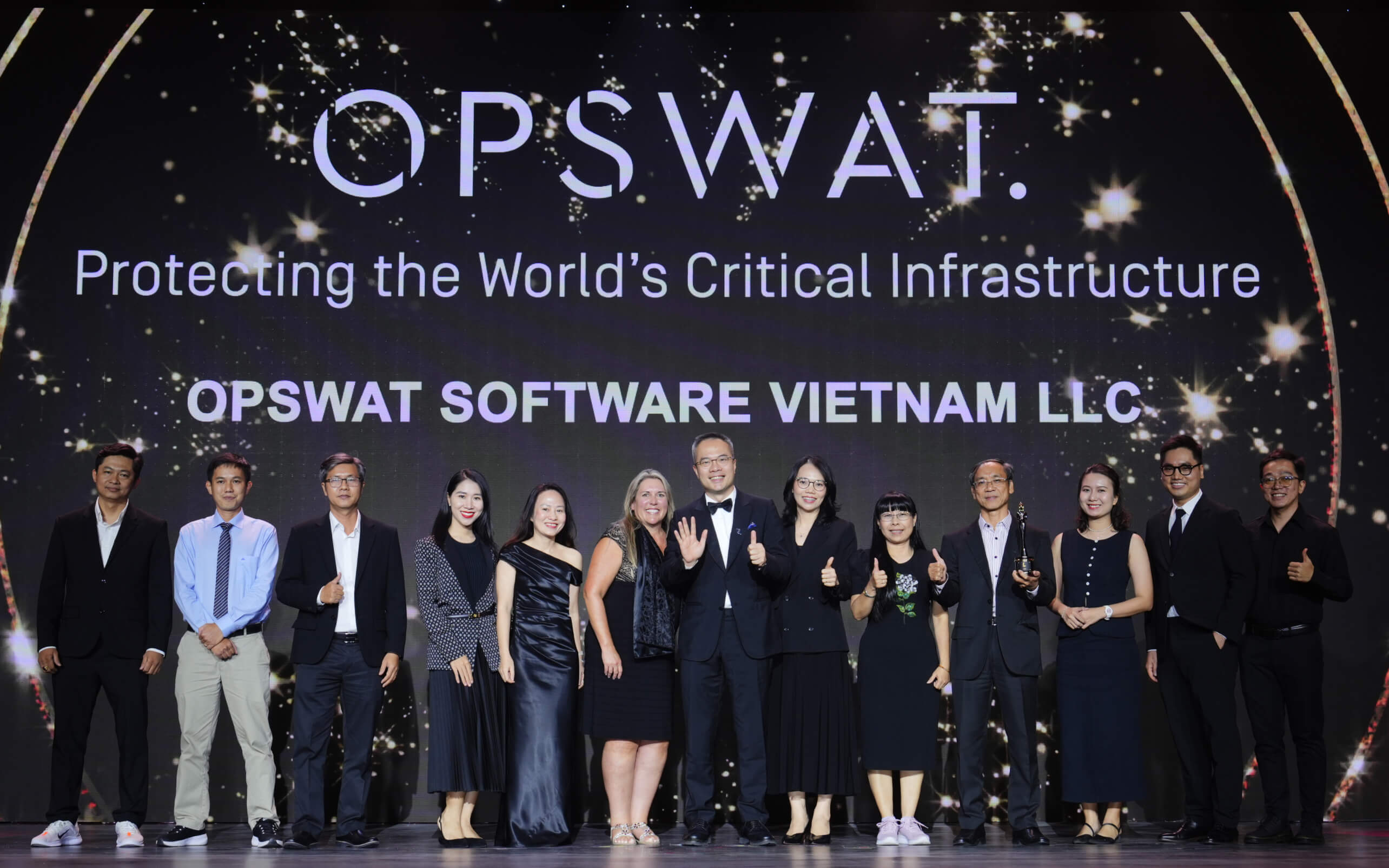 OPSWAT team celebrates OPSWAT wins Best Companies to Work for in Asia 2025 employer award on stage