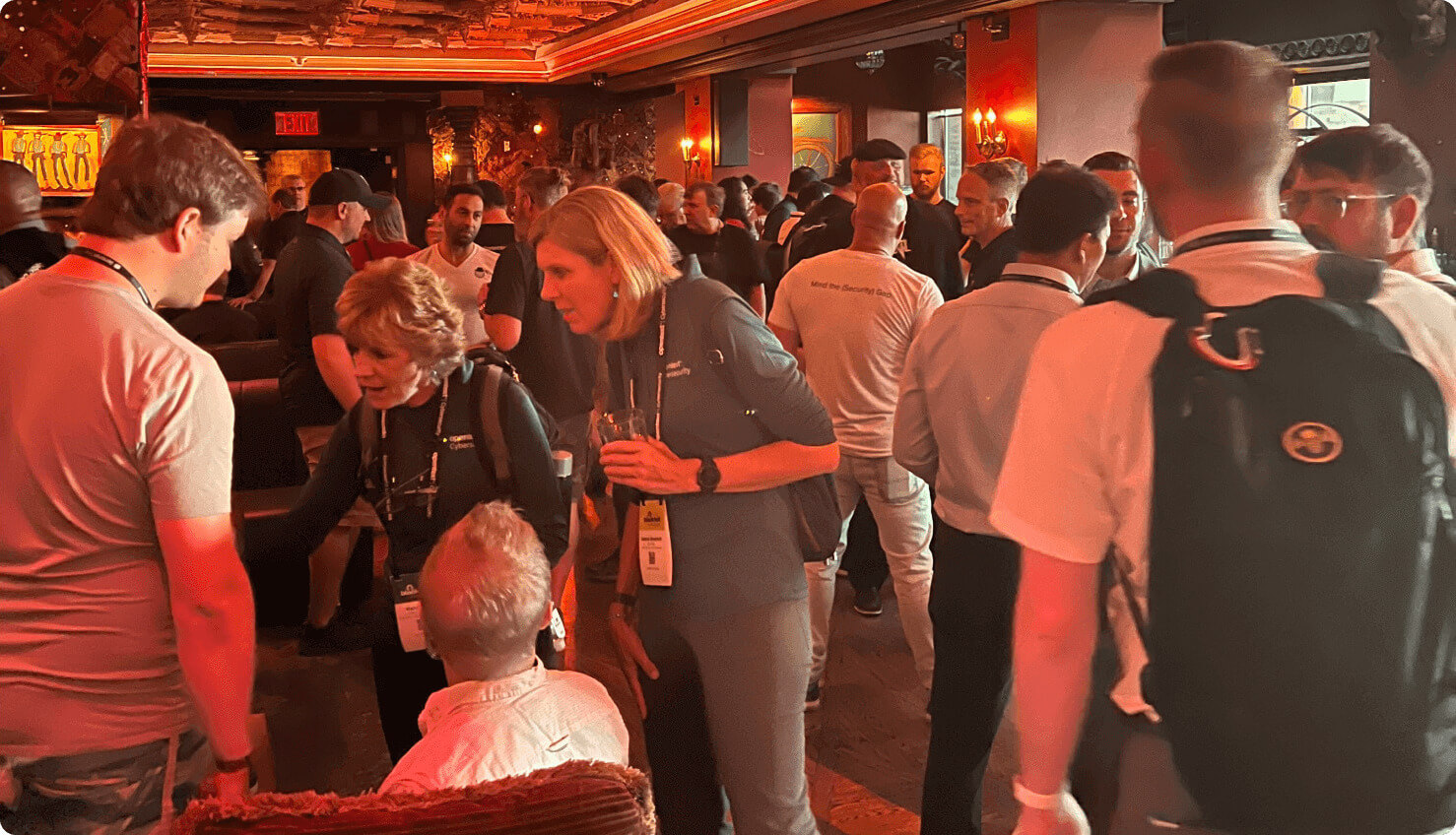 guests talking at the opswat and inquest vip party