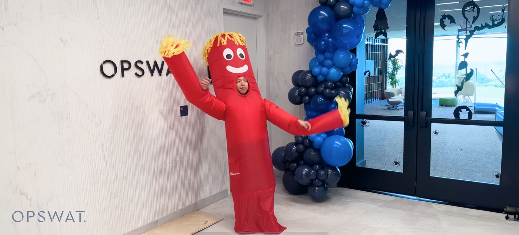 Randy Ying in a red mascot costume